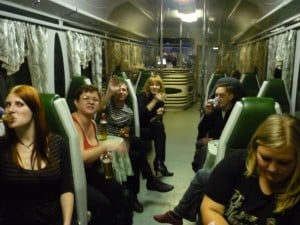 Passengers sitting in Dinner train car