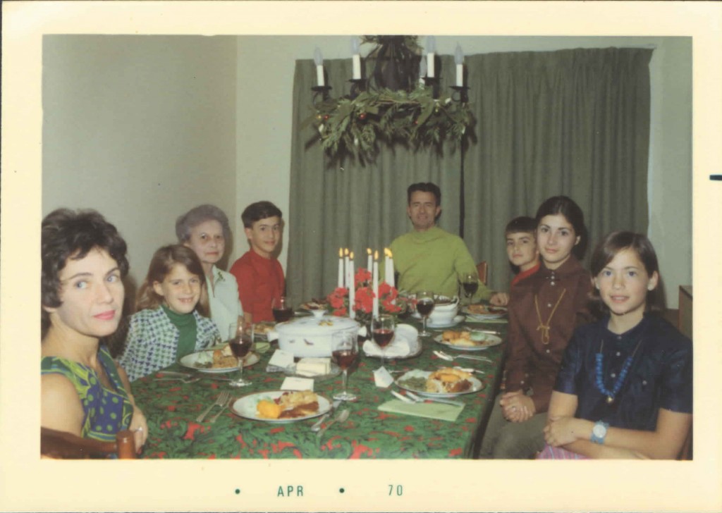 Family sitting down for Christmas Dinner