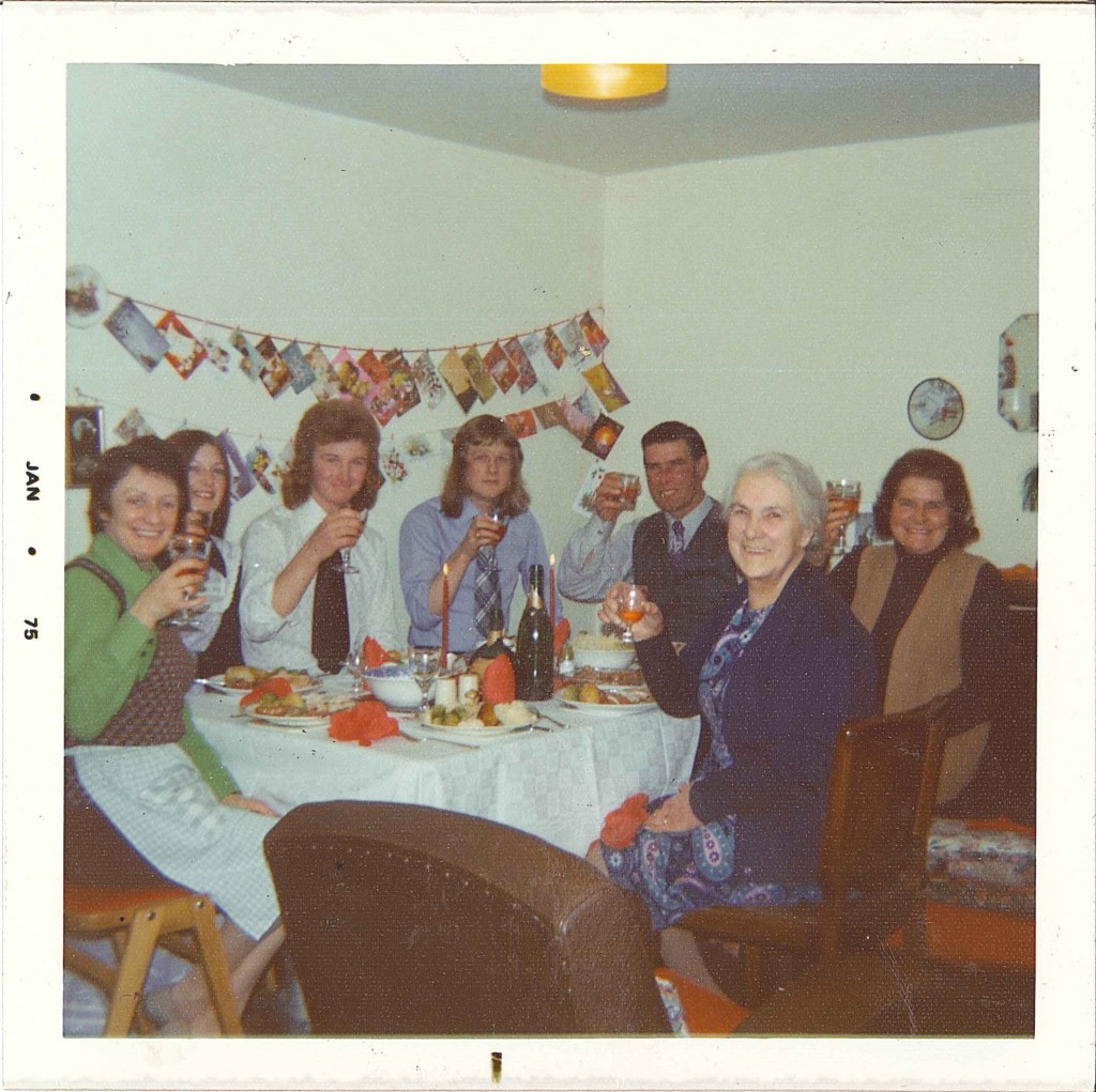 Family toasting around Christmas Dinner