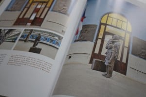 Open magazine spread featuring illustrations from Prague